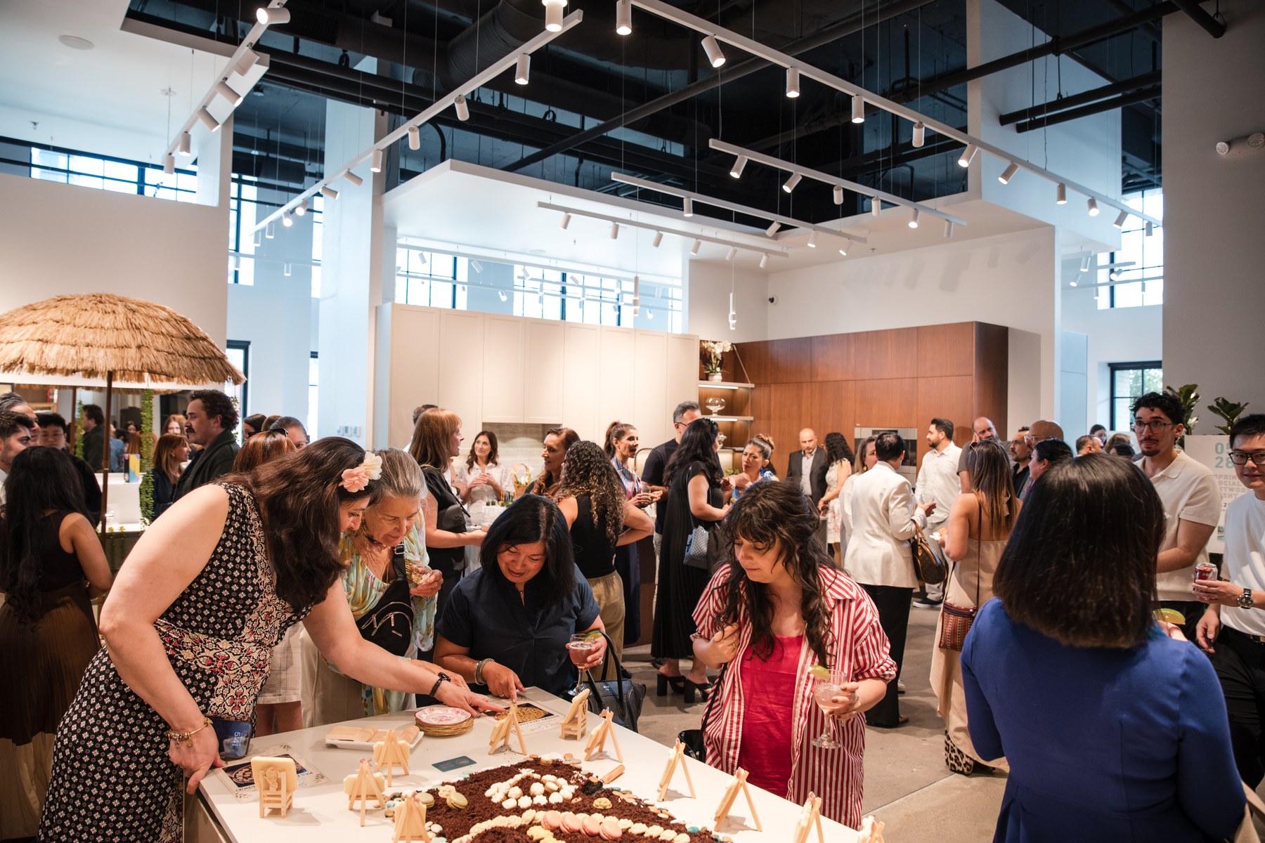Grand opening celebration with guests gathered at the venue